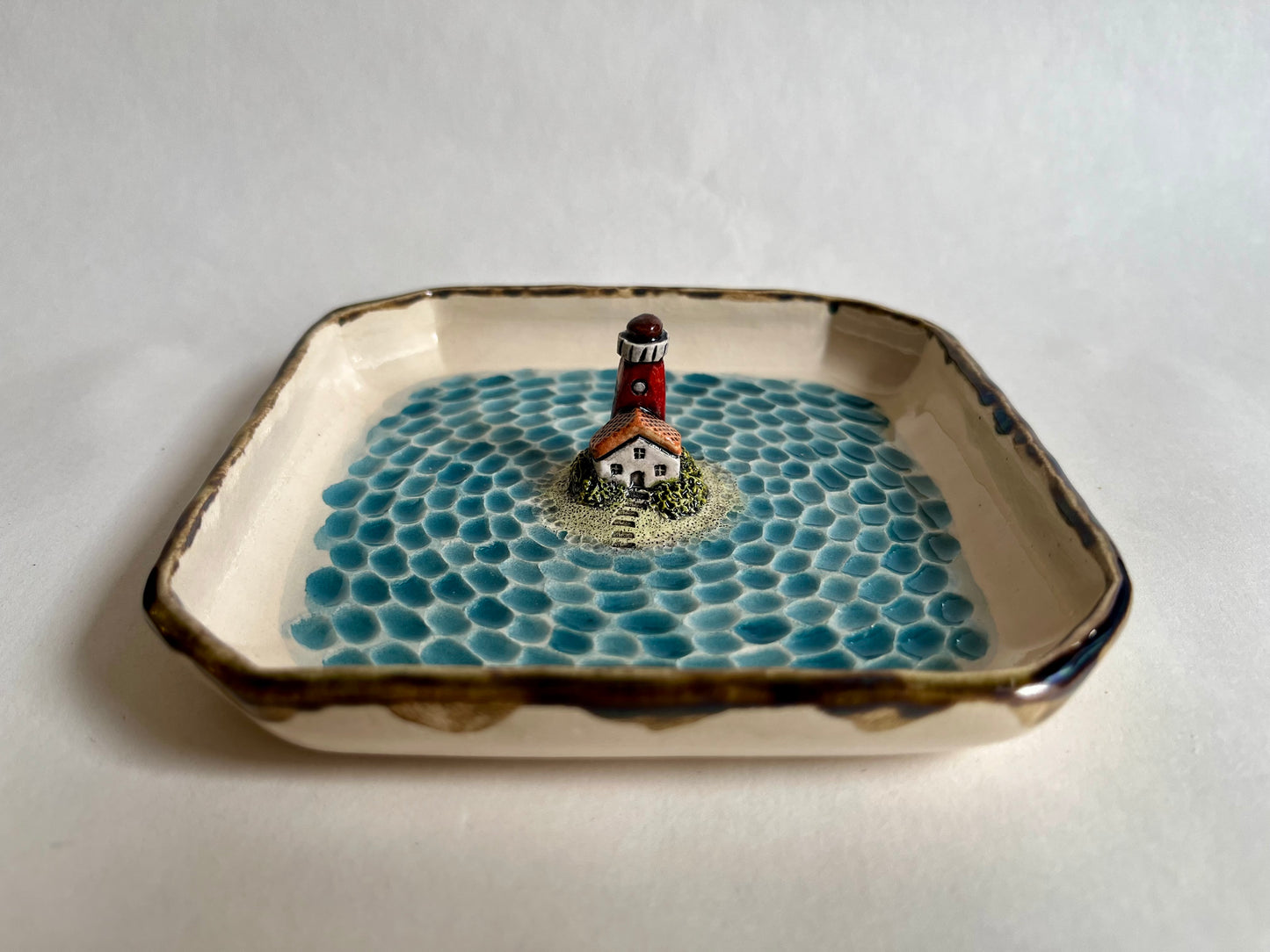 Lighthouse by the sea ceramic diorama