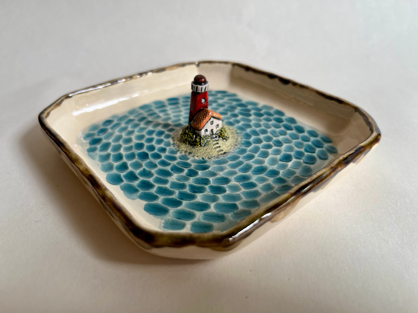 Lighthouse by the sea ceramic diorama