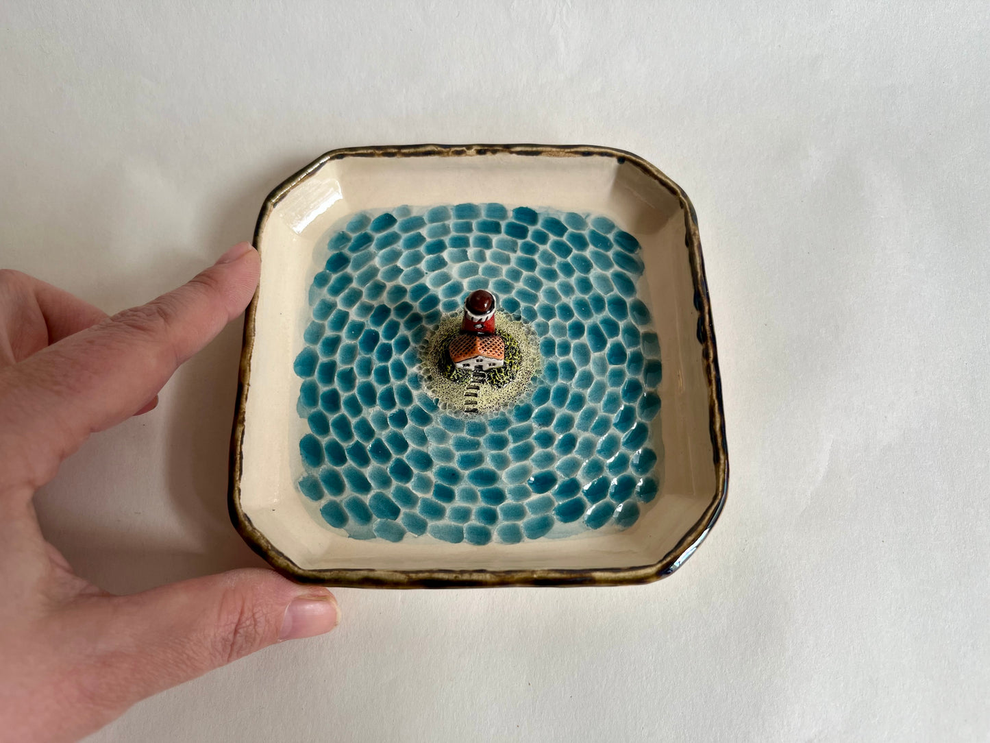 Lighthouse by the sea ceramic diorama